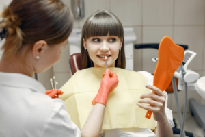 A female patient at a dental clinicImage File name: Cosmetic-Dentistry-Services