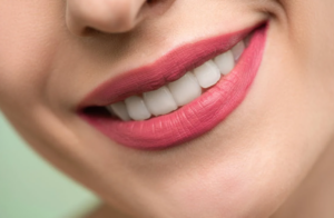 close-up shot of a woman’s lips and smile