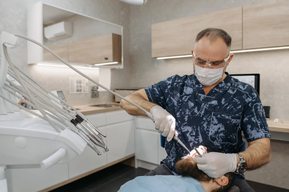 dentist working on a patient’s teeth